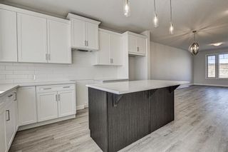 Photo 13: 132 Creekside Drive SW in Calgary: C-168 Semi Detached for sale : MLS®# A1144861