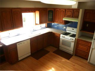 Photo 3: 1530 COMO LAKE AV in Coquitlam: Central Coquitlam House for sale : MLS®# V1082778