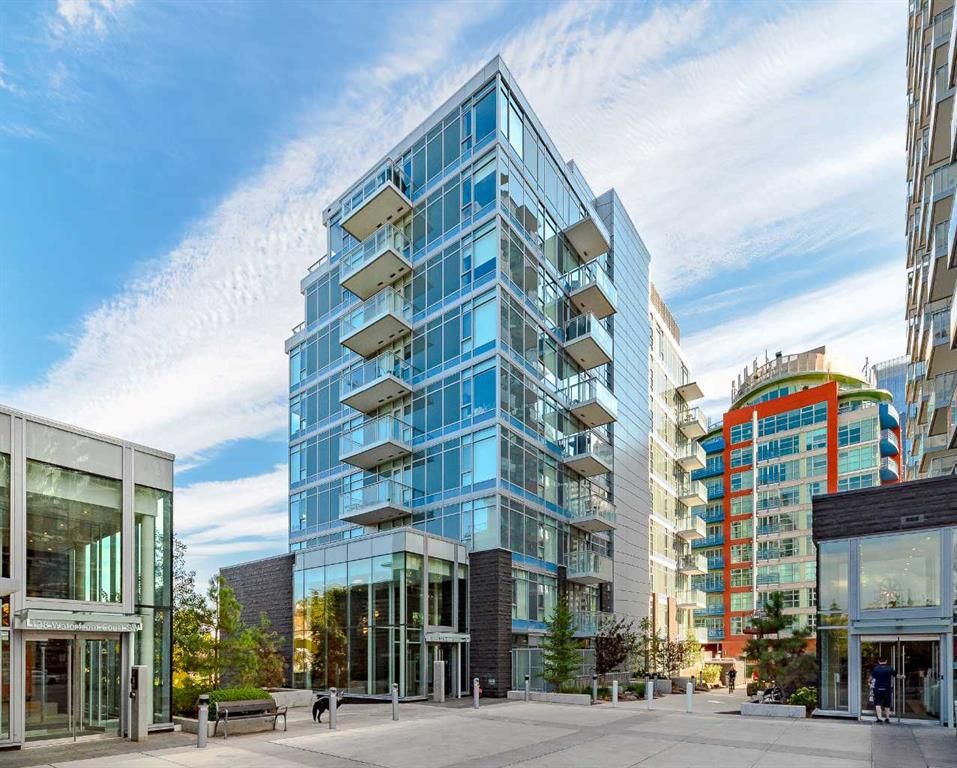 Main Photo: 308 118 Waterfront Court SW in Calgary: Chinatown Apartment for sale : MLS®# A2079080