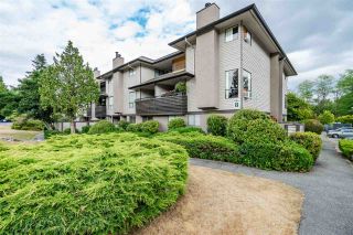 Photo 1: 10560 HOLLY PARK Lane in Surrey: Guildford Townhouse for sale in "HOLLY PARK LANE" (North Surrey)  : MLS®# R2292310