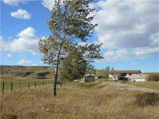 Photo 1: 161058 Secondary Highway 533 in NANTON: Rural Willow Creek M.D. Residential Detached Single Family for sale : MLS®# C3539475