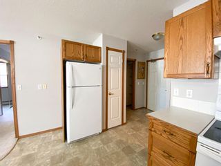 Photo 5: 106 5026 49 Street: Olds Apartment for sale : MLS®# A2072593