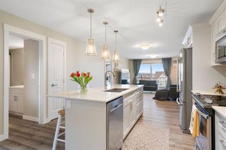 Photo 3: 314 110 Auburn Meadows View SE in Calgary: Auburn Bay Apartment for sale : MLS®# A2117530