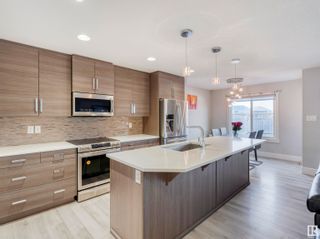 Photo 11: 7279 ARMOUR Crescent in Edmonton: Zone 56 House Half Duplex for sale : MLS®# E4331726