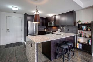 Photo 5: 101 15 Aspenmont Heights SW in Calgary: Aspen Woods Apartment for sale : MLS®# A2014026