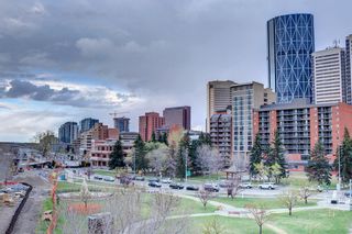 Photo 17: 401 128 Waterfront Court SW in Calgary: Chinatown Apartment for sale : MLS®# A1232067