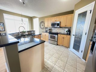 Photo 10: 80 Fairways Drive NW: Airdrie Detached for sale : MLS®# A1093153