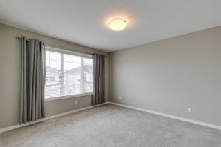 Photo 16: 217 Sunset Point: Cochrane Row/Townhouse for sale : MLS®# A2120759