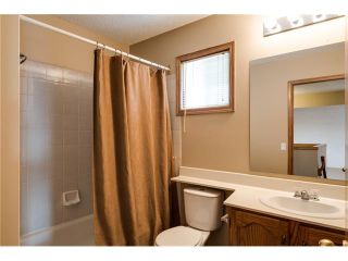 Photo 15: 192 WOODSIDE Road NW: Airdrie House for sale : MLS®# C4092985