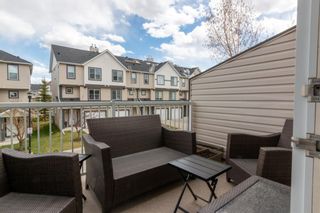 Photo 6: 113 Everhollow Heights SW in Calgary: Evergreen Row/Townhouse for sale : MLS®# A1215012