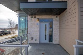 Photo 1: 16 30 Shawnee Common SW in Calgary: Shawnee Slopes Apartment for sale : MLS®# A2123007
