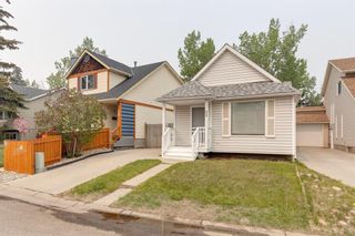 Photo 1: 92 Strandell Crescent SW in Calgary: Strathcona Park Detached for sale : MLS®# A2049782