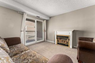 Photo 4: 128 3015 51 Street SW in Calgary: Glenbrook Row/Townhouse for sale : MLS®# A2120789