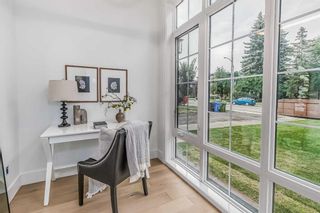 Photo 12: 217 24 Avenue NW in Calgary: Tuxedo Park Detached for sale : MLS®# A2077740