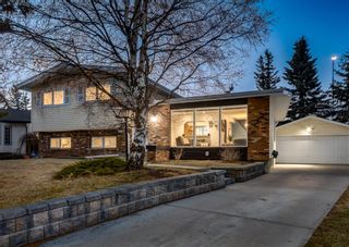 Photo 1: 563 Woodpark Crescent SW in Calgary: Woodlands Detached for sale : MLS®# A1095098