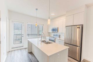 Photo 21: 304 101 Panatella Square NW in Calgary: Panorama Hills Row/Townhouse for sale : MLS®# A2131262