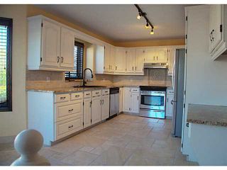 Photo 3: 34 SUNVISTA Crescent SE in Calgary: Sundance Residential Detached Single Family for sale : MLS®# C3636190