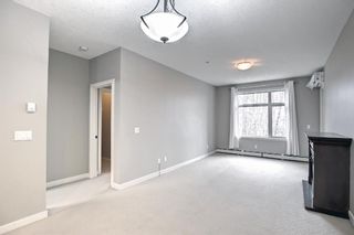 Photo 10: 112 35 Aspenmont Heights SW in Calgary: Aspen Woods Apartment for sale : MLS®# A1161668