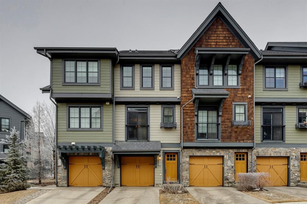 Main Photo: 450 Ascot Circle SW in Calgary: Aspen Woods Row/Townhouse for sale : MLS®# A1188870