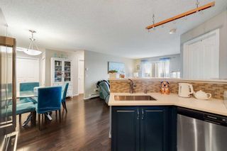Photo 5: 409 17 Country Village Bay NE in Calgary: Country Hills Village Apartment for sale : MLS®# A2120461