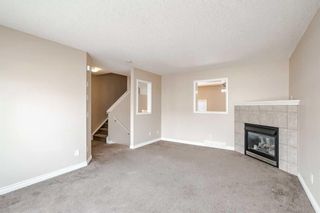 Photo 7: 21 Crystal Shores Cove: Okotoks Row/Townhouse for sale : MLS®# A2126777