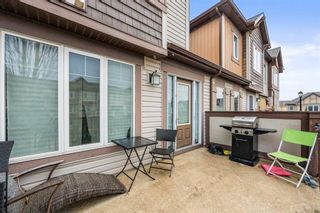 Photo 18: 110 Windstone Crescent SW: Airdrie Row/Townhouse for sale : MLS®# A2129046
