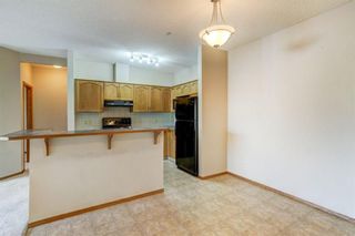 Photo 5: 103 72 Quigley Drive: Cochrane Apartment for sale : MLS®# A1149156