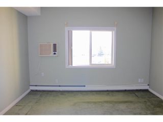Photo 13: 304 72 Quigley Drive: Cochrane Apartment for sale : MLS®# A1196956