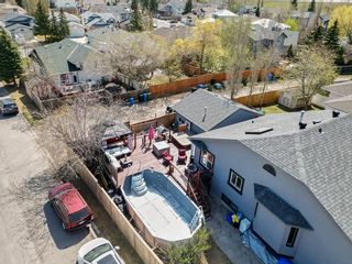 Photo 6: 2 Sundown Manor SE in Calgary: Sundance Detached for sale : MLS®# A2047063