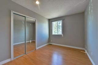 Photo 17: 1301 829 Coach Bluff Crescent in Calgary: Coach Hill Row/Townhouse for sale : MLS®# A1094909