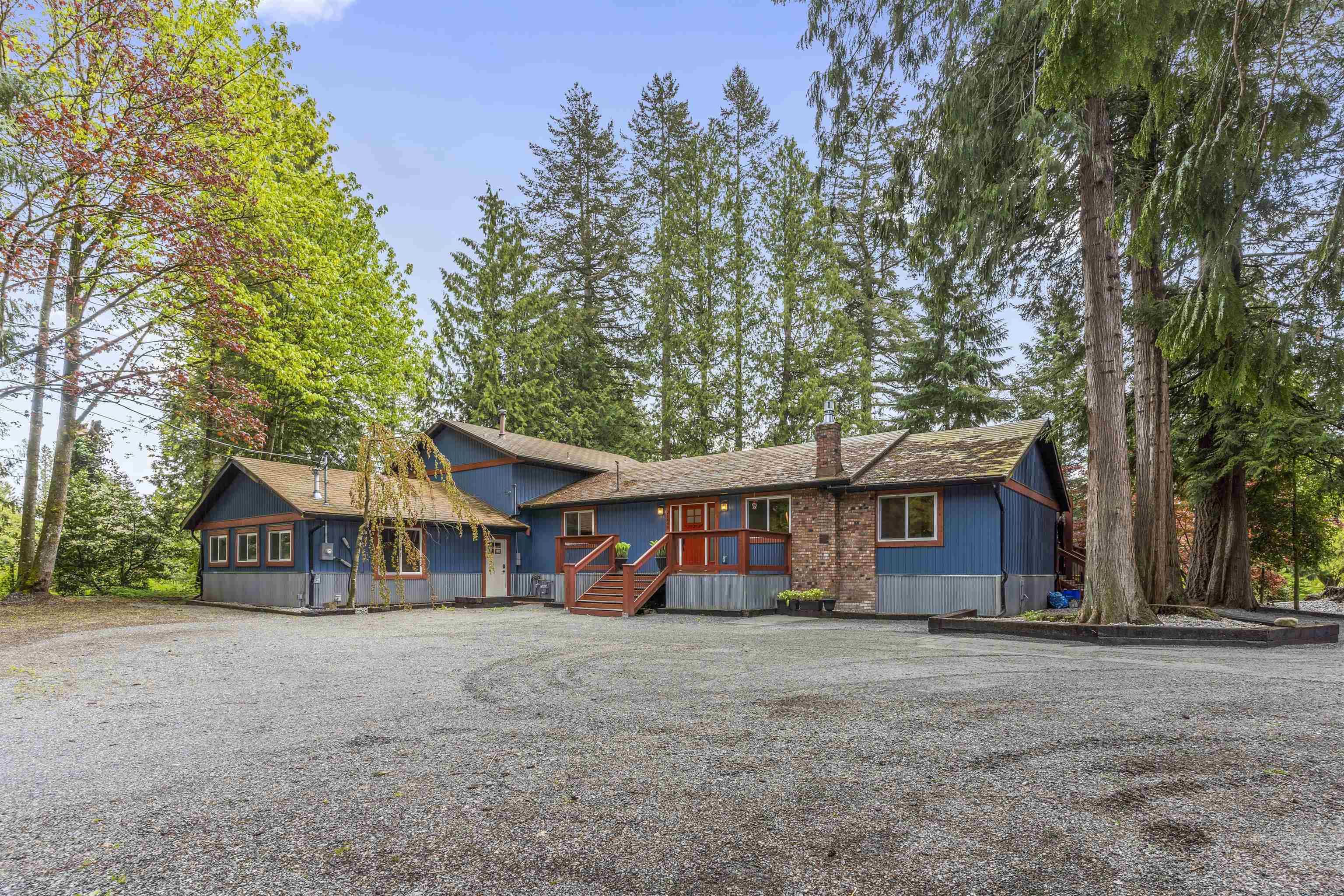 Main Photo: 21648 6 Avenue in Langley: Campbell Valley House for sale : MLS®# R2769989
