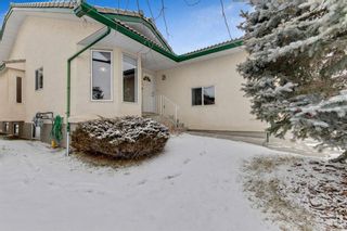 Main Photo: 25 Strathearn Gardens SW in Calgary: Strathcona Park Semi Detached for sale : MLS®# A1166105