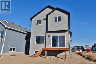 Photo 2: 75 Blackwolf Pass N in Lethbridge: House for sale : MLS®# A1225451