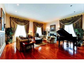 Photo 2: 950 BEND Court in Coquitlam: Harbour Chines House for sale : MLS®# V995881