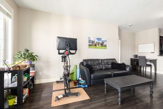 Photo 11: 3206 15 Sunset Square: Cochrane Apartment for sale : MLS®# A2120249