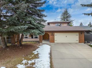 Photo 1: 12323 17 Street SW in Calgary: Woodlands Detached for sale : MLS®# A2121365