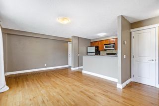 Photo 2: 203 1027 1 Avenue NW in Calgary: Sunnyside Apartment for sale : MLS®# A1234036