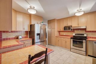 Photo 11: 354 Country Club Boulevard in Winnipeg: St Charles Residential for sale (5G)  : MLS®# 202401771