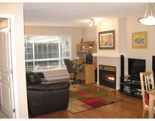 Photo 2: 110 1242 TOWN CENTRE Boulevard in Coquitlam: Canyon Springs Condo for sale in "THE KENNEDY" : MLS®# V811939