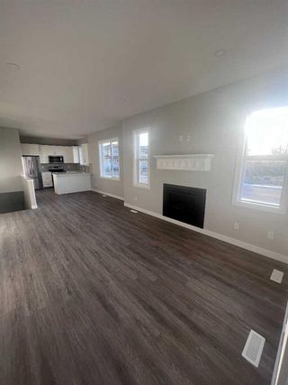 Photo 5: 6301 58A Street: Rocky Mountain House Semi Detached (Half Duplex) for sale : MLS®# A2109083
