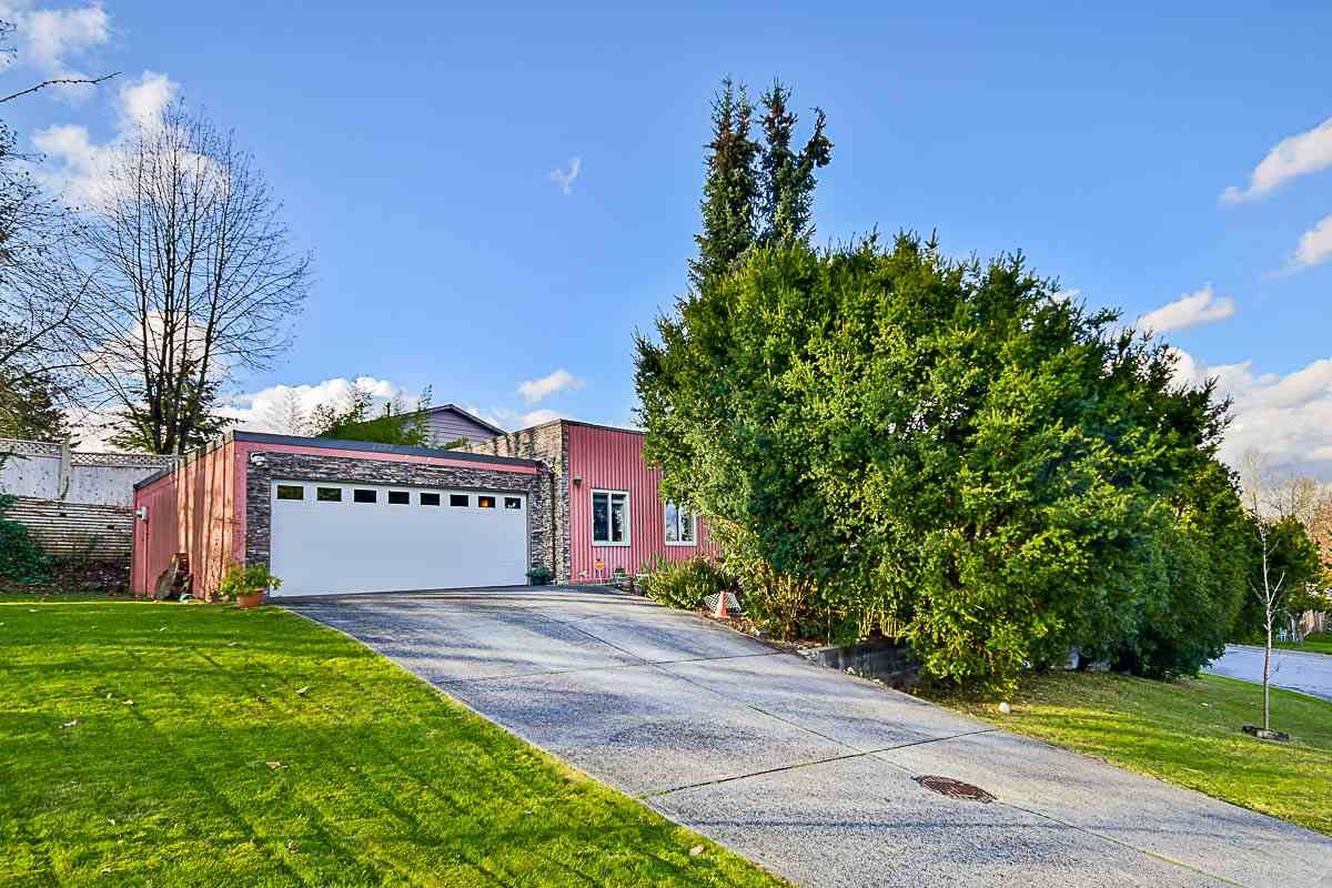 Main Photo: 7887 SUNCREST Drive in Surrey: East Newton House for sale : MLS®# R2125728