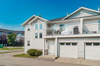 Main Photo: 502 Country Village Cape NE in Calgary: Country Hills Village Row/Townhouse for sale : MLS®# A2079123