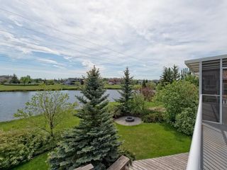 Photo 3: 167 LAKESIDE GREENS Court: Chestermere House for sale : MLS®# C4120469