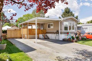 Photo 1: 76 145 KING EDWARD Street in Coquitlam: Maillardville Manufactured Home for sale in "MILL CREEK VILLAGE" : MLS®# R2574767