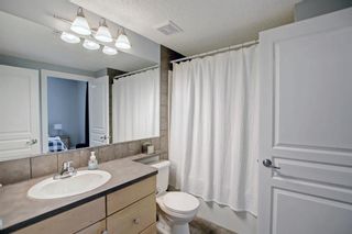 Photo 25: 1 108 Rockyledge View NW in Calgary: Rocky Ridge Row/Townhouse for sale : MLS®# A1234759