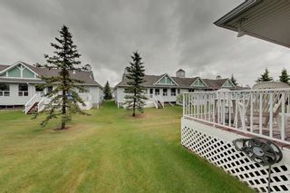 Photo 4: 38 1008 Woodside Way NW: Airdrie Row/Townhouse for sale : MLS®# A1123458