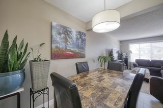 Photo 12: 555 Panatella Boulevard NW in Calgary: Panorama Hills Row/Townhouse for sale : MLS®# A2034434