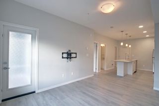Photo 3: 121 20 Seton Park SE in Calgary: Seton Apartment for sale : MLS®# A1180589