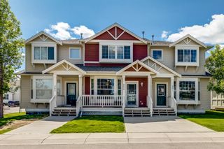 Photo 1: 202 703 Luxstone Square SW: Airdrie Row/Townhouse for sale : MLS®# A1233833