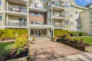 Photo 3: 310 20189 54 Avenue in Langley: Langley City Condo for sale in "Catalina Gardens" : MLS®# R2878294
